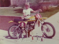 Brian and his 1974 175MX race bike and trophies-1.jpg