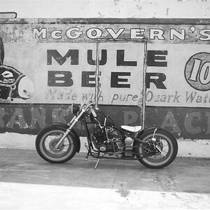 200 in front of an old sign.  Don't ya wish beer was still 10 cents?
