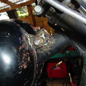 Starting to work on the bike now again, after the long hot summer. Still hot, but bearable. Made this to mount front of ancient gas tank. Whatever the