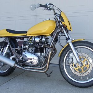 Overall shot of the R/H side of the bike. Needs Graphics, huh? Paint is Ferrari Yellow and the frame is a Chrysler color called Austin Tan. I had my p