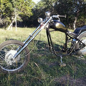 '71 XS1B, chopped in '75, been down for rebuild since 1978.
Use your imagination, heavily modified 750, Mikuni roundslide 36's,
lots chrome, TT tuck