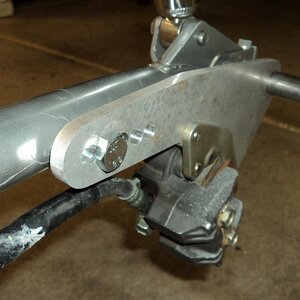 Iso view of custome bracket and rear brake.  Holes will become one slot for rear wheel adjustment