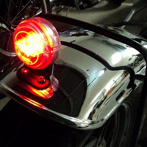 yoyo tail light, red led (modified Auto Zone tail light brake light bulb) (looks orange in photo but it is bright red)