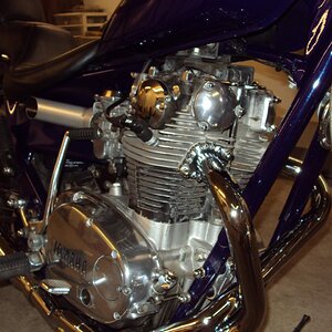 The engine was so clean with no oil leaks that when I built the bike I decided not to repaint any of the black,I just machine polished the covers.