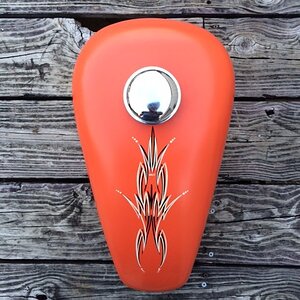 New never run sporty tank. Flat orange paintjob isn't that great, but pinstriping is cool. Chipping on the lower seam. $140 shipped in the U.S.