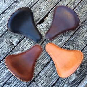 Thinning out my inventory. I have 4 of my handmade leather solo seats that I'm selling at a discount on a first-come, first-served basis. I retail the
