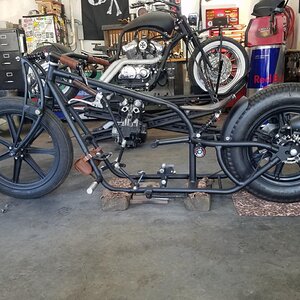 custom built frame with extended backbone for single carb set up with modified jockey shift.