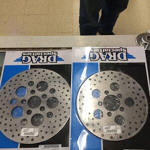 Ultimate answer to the problem of the rotors was fitment for 74 FL, which are 10" with 2.375" center. Drag Specialties sold them in matching set for f
