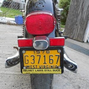 XS75
Model Year plates. Plate holder from an early 700 Shadow.