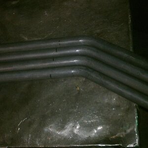 1 1/8" .12 wall seamless tube bent to 35deg from work 72bux for 16' SWEET! I did the bends ;)