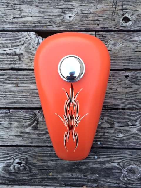 New never run sporty tank. Flat orange paintjob isn't that great, but pinstriping is cool. Chipping on the lower seam. $140 shipped in the U.S.