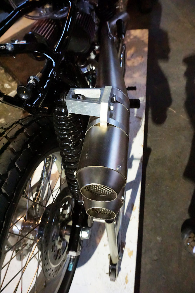 This mufler mount seemed too bulky and crude compared to the rest of the bike.