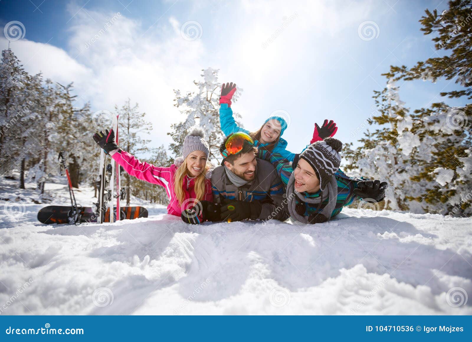 family-children-having-fun-snow-mountain-104710536.jpg