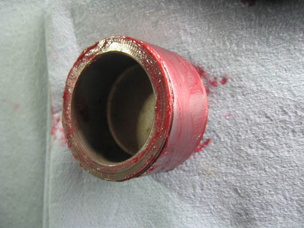 rake-caliper-piston-smeared-with-red-rubber-grease.jpg