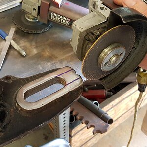 Use a cutoff disk or bandsaw to cut the lines.