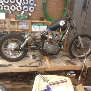 Pictured is my 1983 xs650 project. The swingarm was extended with my axle plate extensions, and in this picture, the axle is all the way at the rear o